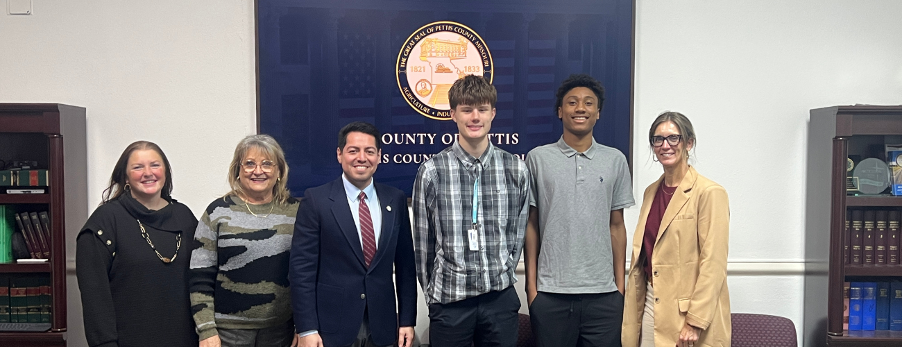 Two CAPS associates along with a Instructor at a meeting at the courthouse in sedalia Mo.