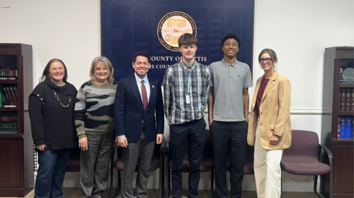Two CAPS associates along with a Instructor at a meeting at the courthouse in sedalia Mo.